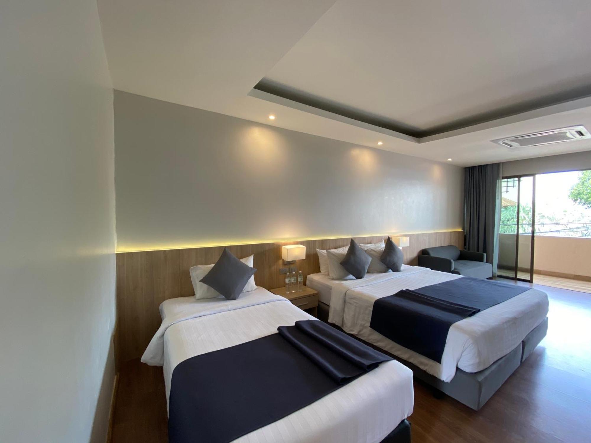 Coconut Village Resort Phuket - Sha Extra Plus Patong Pokoj fotografie